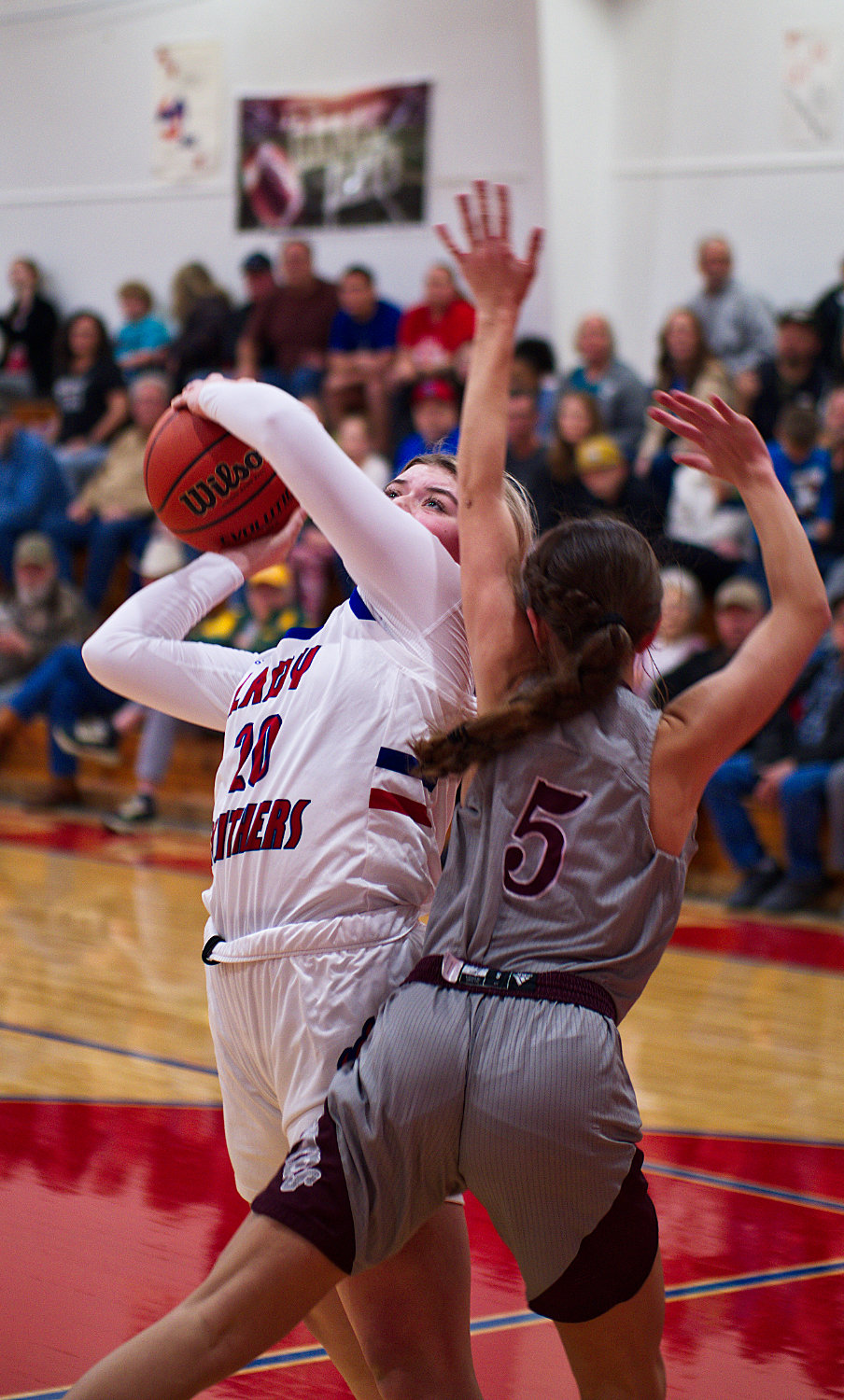 Alexis Wilmut goes up strong, earning a trip to the free throw line. [see more shots, buy basketball photos]